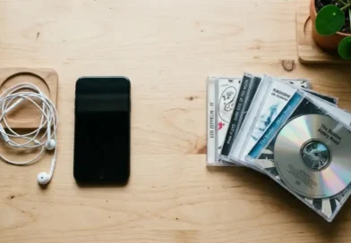 CDiPhone myth explained: an iPhone next to a stack of music CDs showing the two cannot connect directly